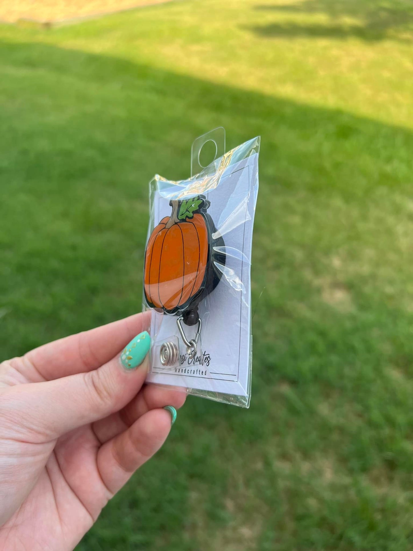 Pumpkin Badge Reel