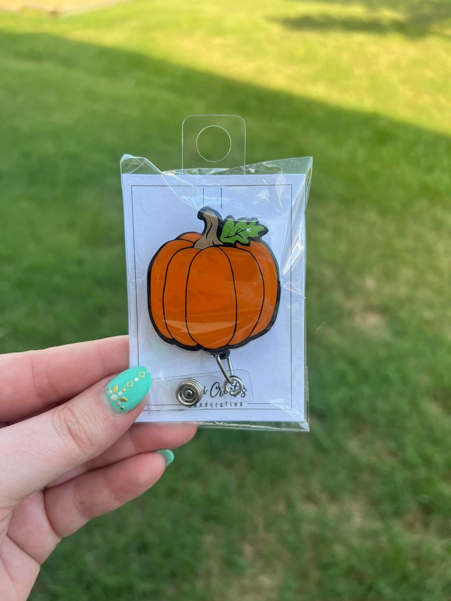 Pumpkin Badge Reel