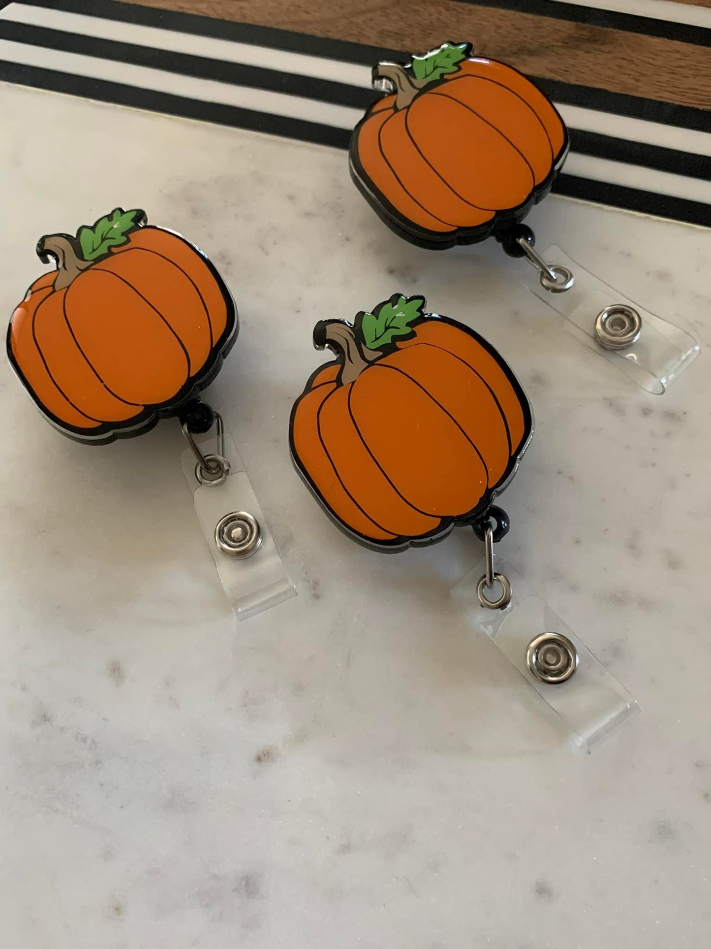 Pumpkin Badge Reel
